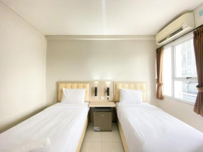 Comfort and Homey Studio Room (No Kitchen) Elvis Tower Apartment By Travelio